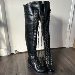 Thigh high lace up combat boots